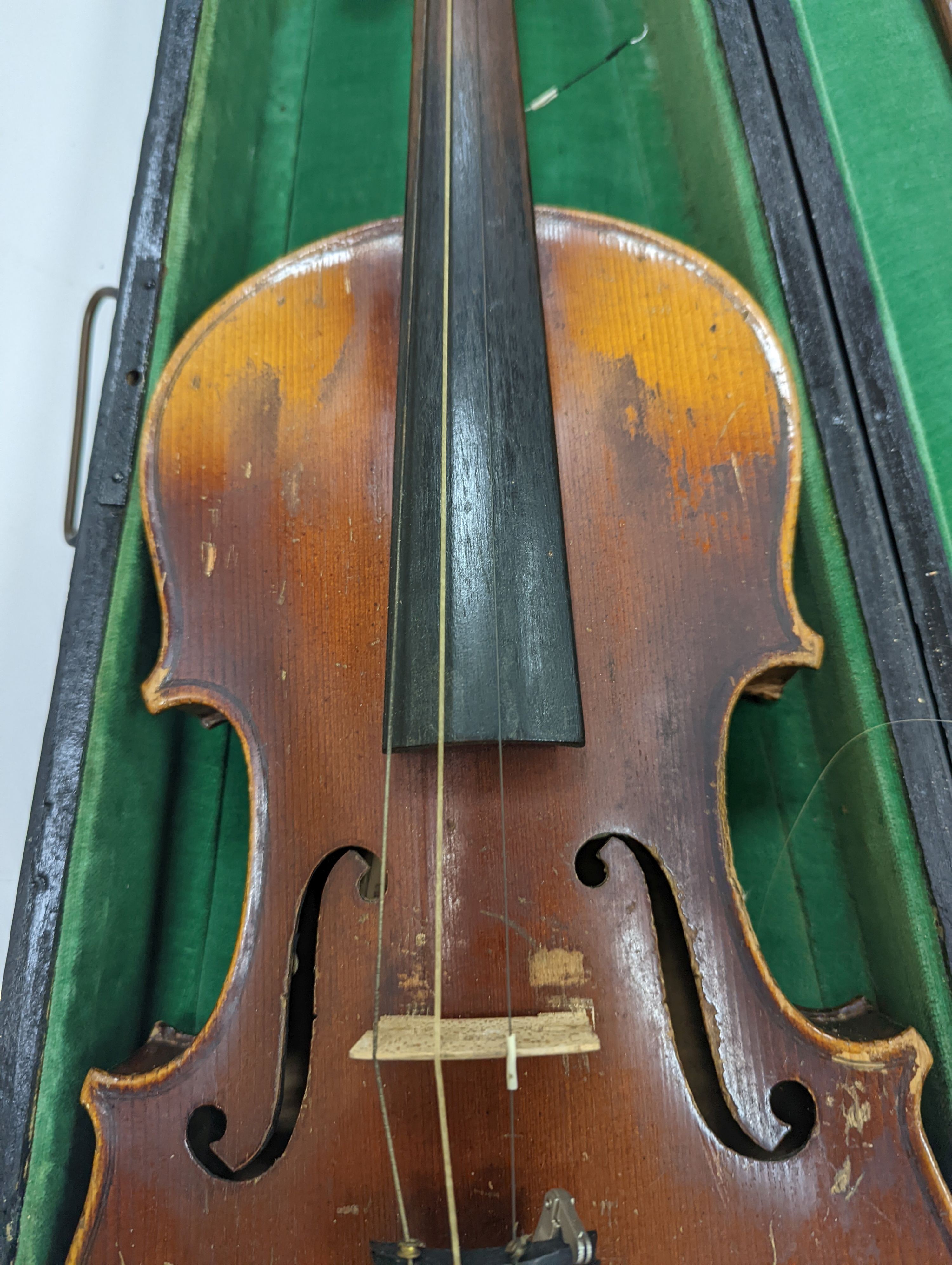 Two cased violins and bows, one with ‘Antonius Straduarius Cremonensis Faciebat Anno 17/13 Made In Czechoslovakia’ label to interior